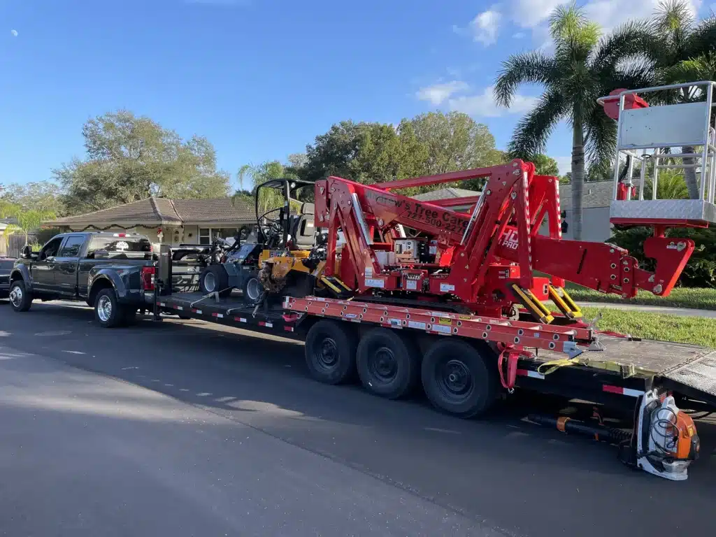Andrew’s Tree Care emergency response truck arriving at residential property with fallen tree